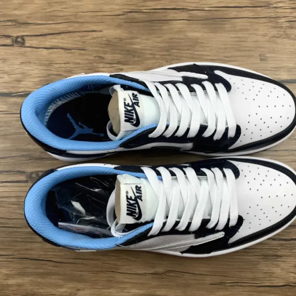 Travis Scott x Air Jordan 1 Low “UNC” White Navy Blue
